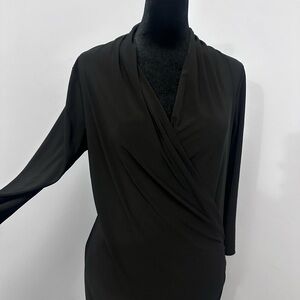 A black dress with cross front and knee length. Very sexy.